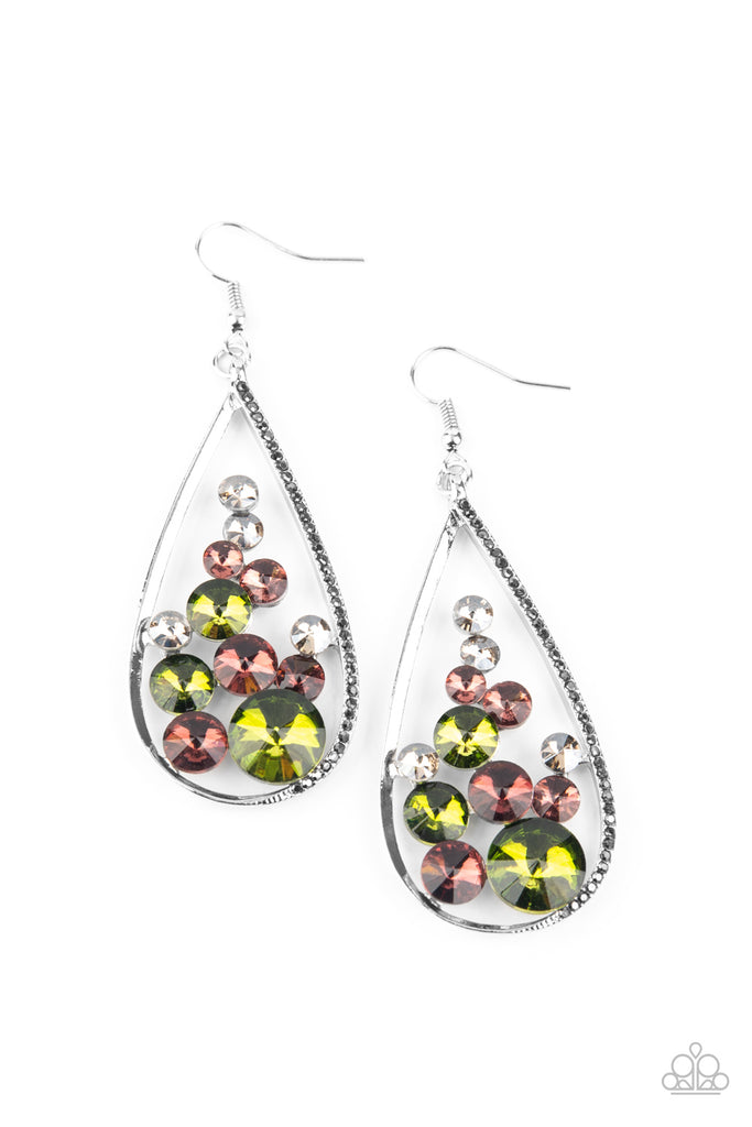 An oversized collection of glittery purple, green, and smoky rhinestones collect inside a shimmery silver teardrop. One side of the frame is encrusted in dainty hematite rhinestones, adding an elegant edge to the glamorous lure. Earring attaches to a standard fishhook fitting. Sold as one pair of earrings.