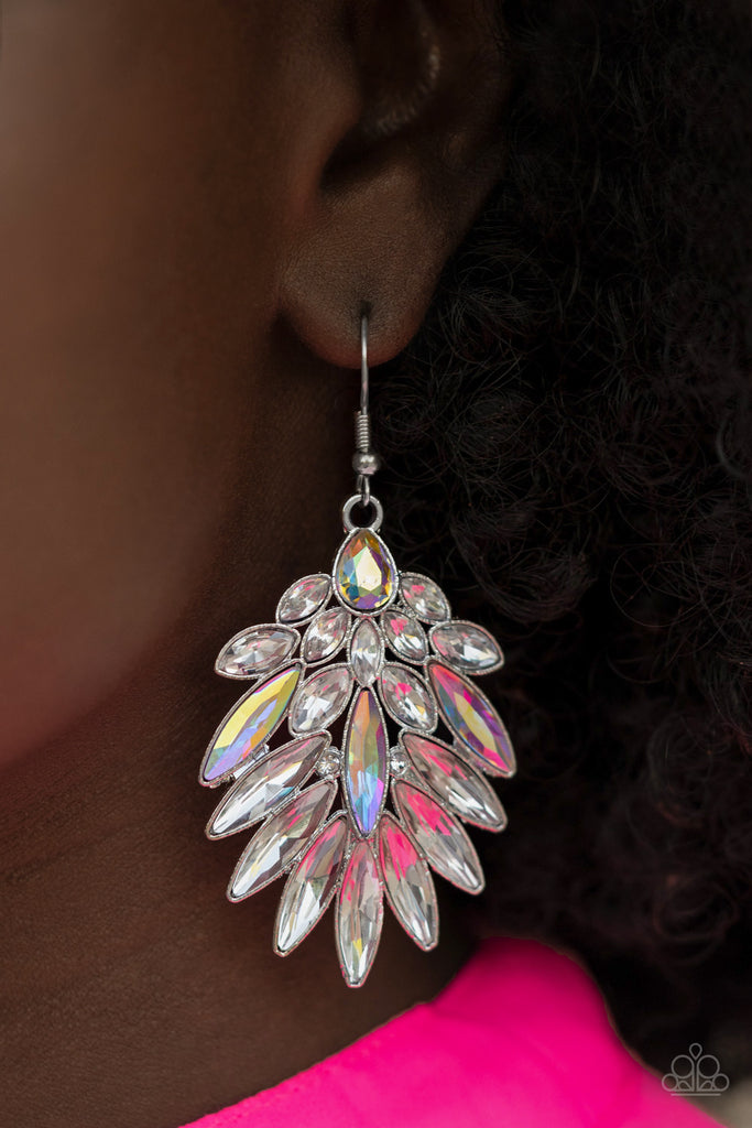 An iridescent teardrop rhinestone gives way to a sparkly fan of classic white and oblong iridescent marquise cut rhinestones, coalescing into an out-of-this-world statement piece. Earring attaches to a standard fishhook fitting.  Sold as one pair of earrings.