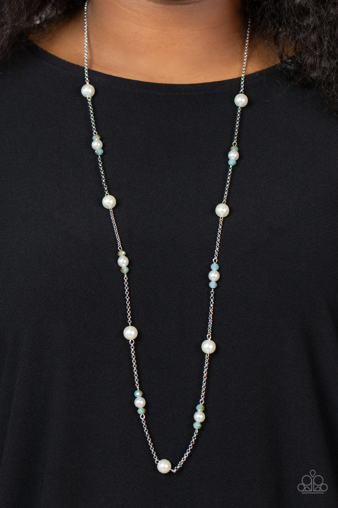 keep-your-eye-on-the-ballroom-blue Dotted with bubbly white pearls, an extended silver chain is adorned with metallic flecked blue opal gems and dainty white pearls for an elegant fashion. Features an adjustable clasp closure.  Sold as one individual necklace. Includes one pair of matching earrings.