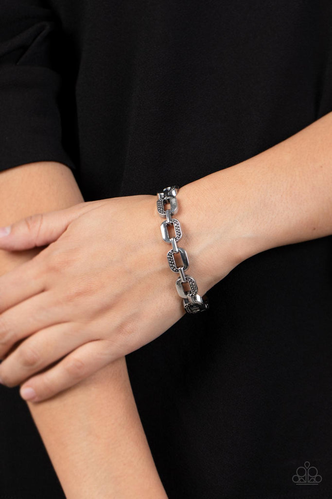 Powerhouse Plunder - Silver Bracelet-Paparazzi