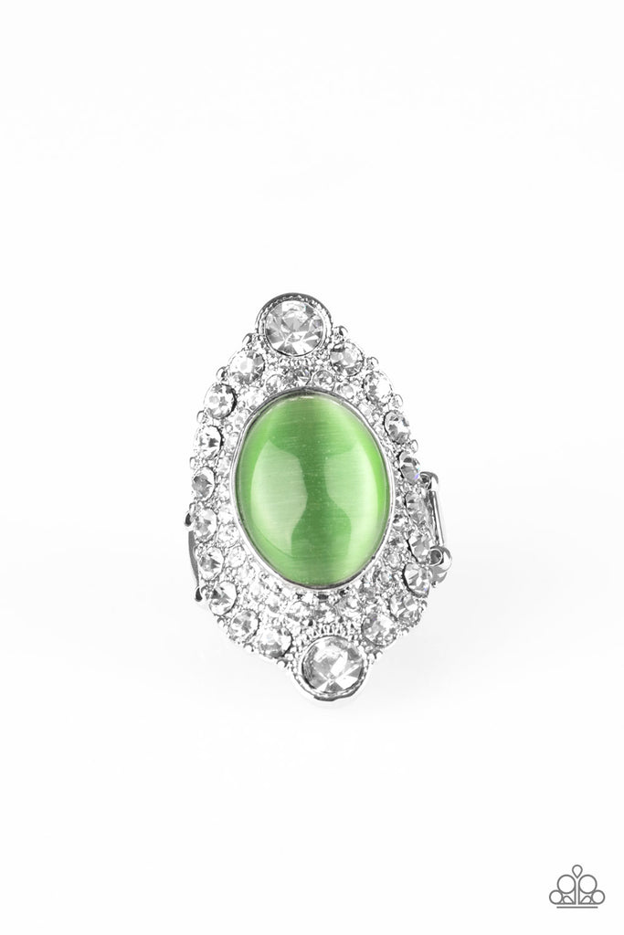 A glowing green moonstone is pressed into a dramatic silver band radiating with glassy white rhinestones for a glamorous flair. Features a stretchy band for a flexible fit.  Sold as one individual ring.