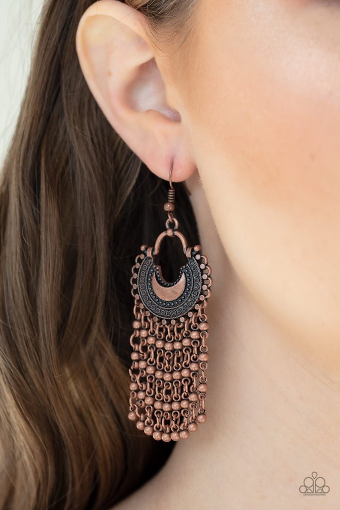 Beaded copper chains stream from the bottom of a textured half-moon copper frame, creating a dreamy fringe.  Earring attaches to a standard post fitting.  Sold as one pair of earrings.