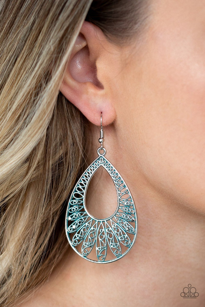 Brushed in a refreshing blue finish, a shimmery silver teardrop frame rippling with ornate petal-like textures swing from the ear in a whimsical fashion. Earring attaches to a standard fishhook fitting.  Sold as one pair of earrings.