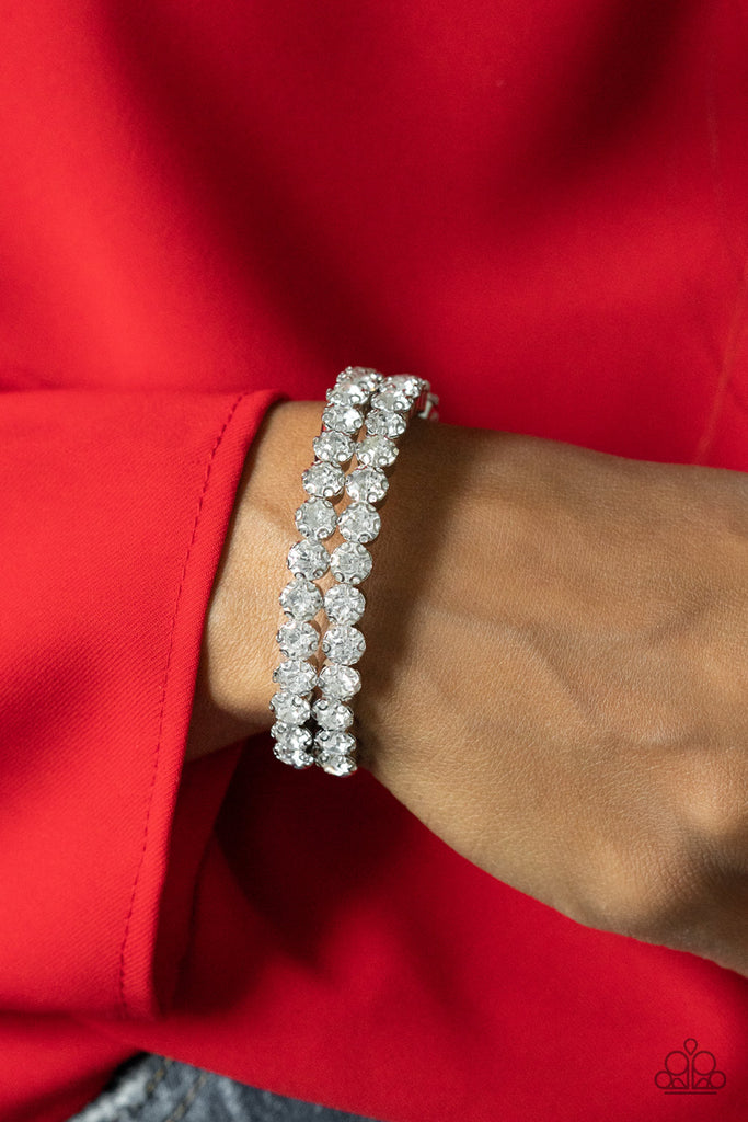 Dec 2021 Life of the Party Exclusive  Encased in sleek silver fittings, two oversized rows of glassy white rhinestones stack into a blinding cuff around the wrist for a jaw-dropping look.  Sold as one individual bracelet.