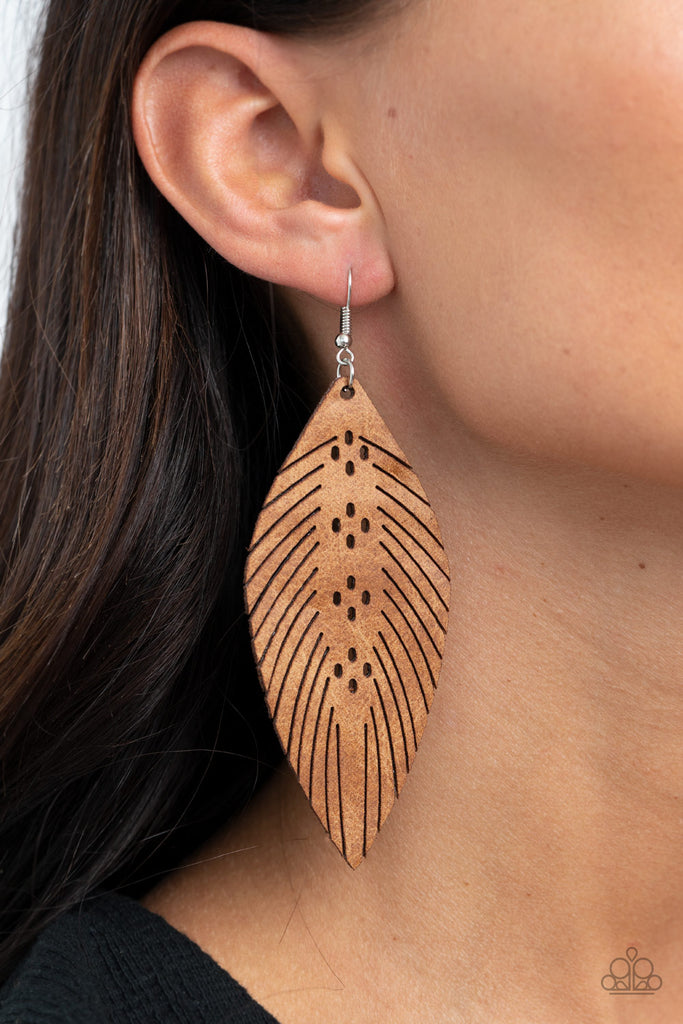 Spliced and stenciled in whimsical detail, a distressed leather frame is cuter into a feathery frame for a free-spirited finish. Earring attaches to a standard fishhook fitting.  Sold as one pair of earrings.