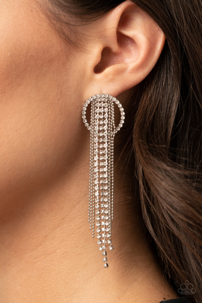 paparazzi life of the party Dainty strands of glassy white rhinestones and shimmery silver ball-chain stream from the top of a bedazzled white rhinestone hoop, creating a dazzling fringe. Earring attaches to a standard post fitting.  Sold as one pair of post earrings.