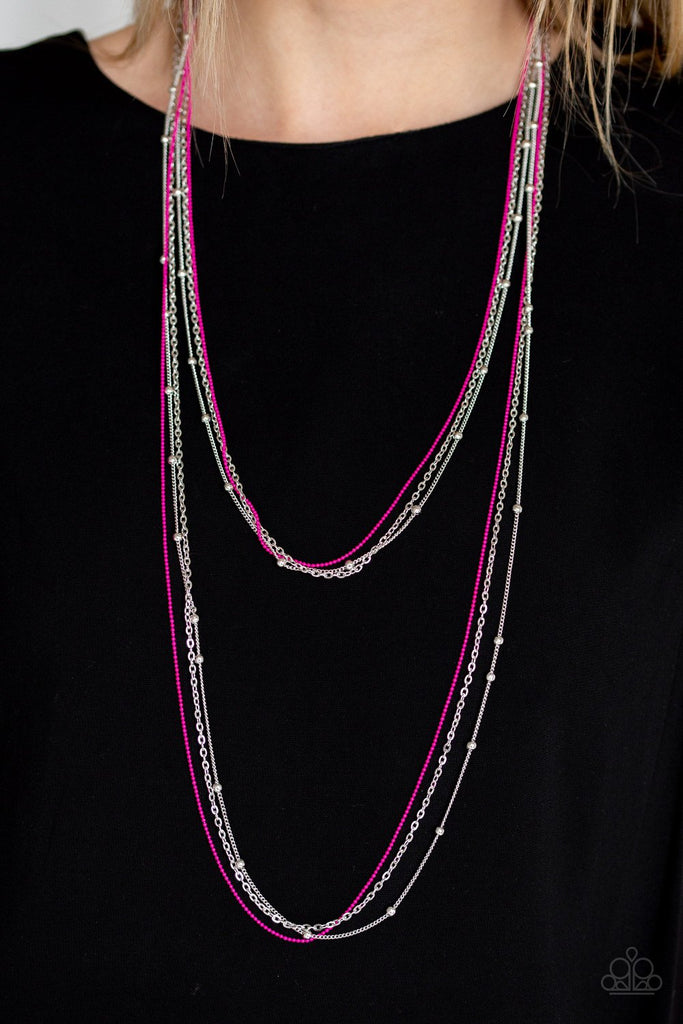 Mismatched silver chains and silver satellite chains layer down the chest. Brushed in a vivacious pink finish, layers of ball-chain are added to the whimsical compilation for a colorful finish. Features an adjustable clasp closure.  Sold as one individual necklace. Includes one pair of matching earrings.