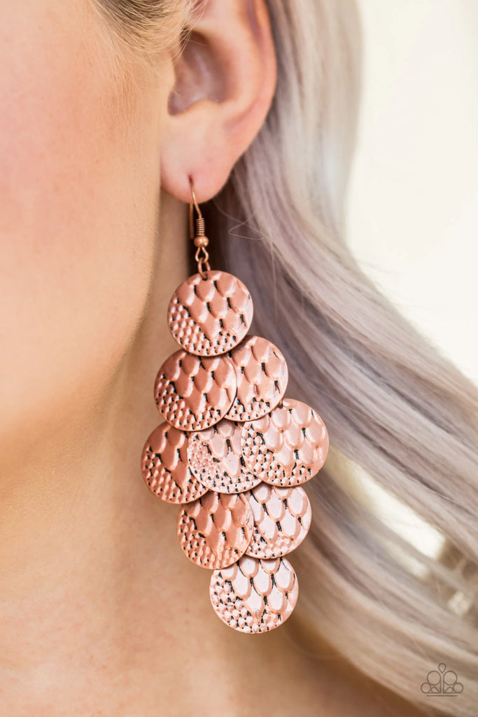 Rippling with antiqued textures, glistening copper discs cascade from the ear for an edgy look. Earring attaches to a standard fishhook fitting.  Sold as one pair of earrings.  