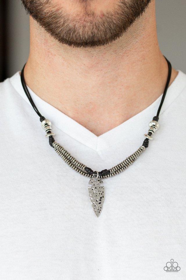 Infused with rows of metallic beaded accents, a hammered silver arrowhead pendant is knotted in place below the collar for a seasonal look. Features a button loop closure.  Sold as one individual necklace.
