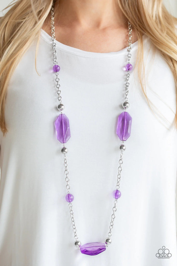 A collection of glassy purple beads, shiny silver beads, and oversized faceted crystal-like beads trickle along a shimmery silver chain across the chest for a whimsically refined look. Features an adjustable clasp closure.  Sold as one individual necklace. Includes one pair of matching earrings.  