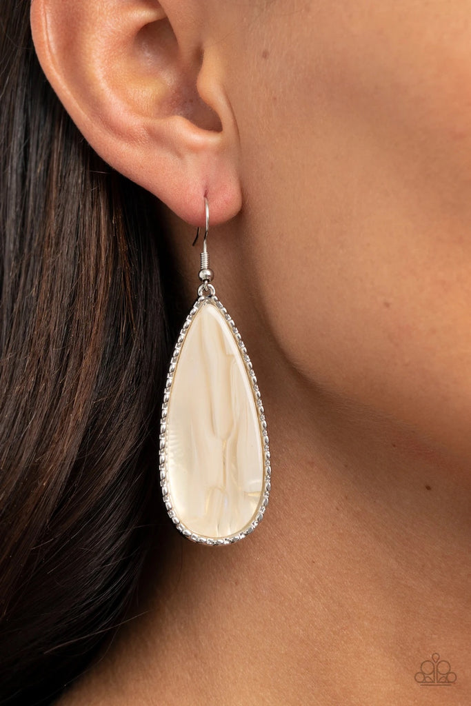 Featuring a shell-like shimmer, a faux marble acrylic teardrop is encased in a studded silver frame for an ethereally refined fashion. Earring attaches to a standard fishhook fitting.  Sold as one pair of earrings.