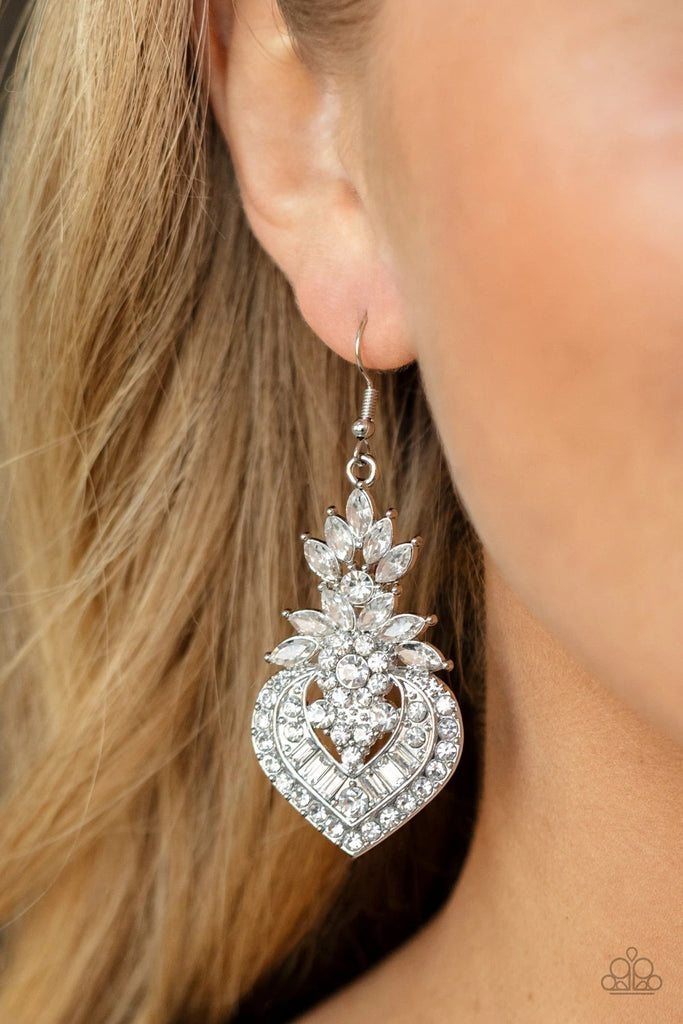 Dotted with dainty white rhinestones, a series of round, marquise, and emerald cut white rhinestones stack into a decorative frame for a dramatic finish. Earring attaches to a standard fishhook fitting.  Sold as one pair of earrings.  