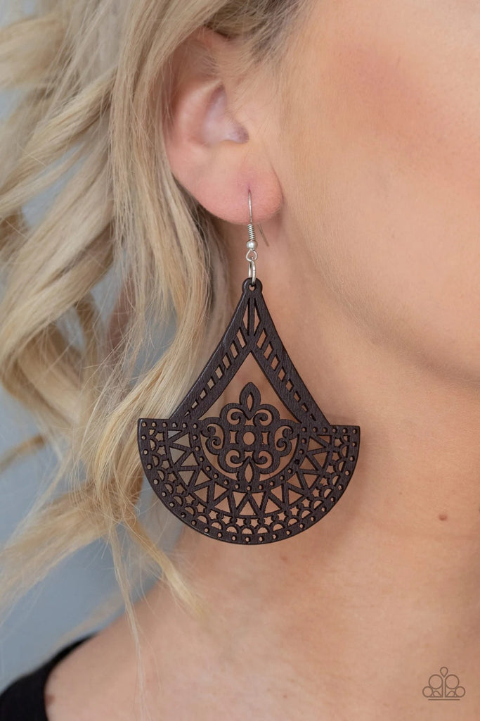 Stenciled in an airy wooden filigree pattern, a decorative frame swings from the ear for a seasonal look. Earring attaches to a standard fishhook fitting.  Sold as one pair of earrings.  