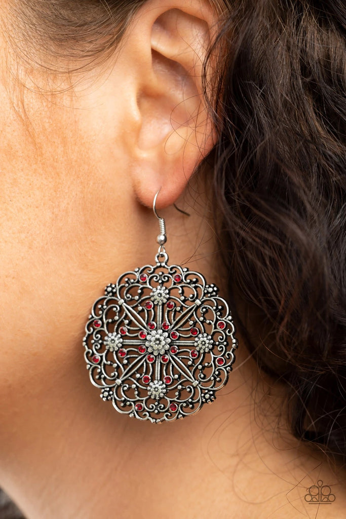 Dotted with glittery red rhinestones and dainty silver flowers, antiqued filigree whirls into a whimsical frame for a colorful look. Earring attaches to a standard fishhook fitting.  Sold as one pair of earrings.