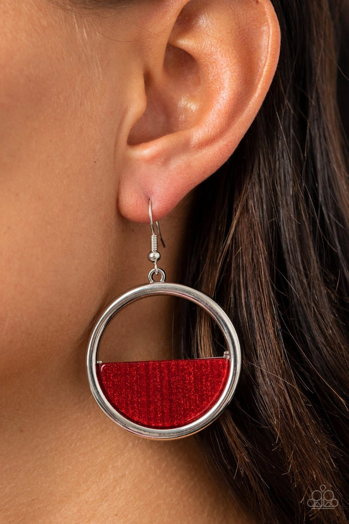 A glittering Samba acrylic crescent frame is nestled on the bottom of a shimmery silver hoop, coalescing into a colorfully retro frame. Earring attaches to a standard fishhook fitting.  Sold as one pair of earrings.