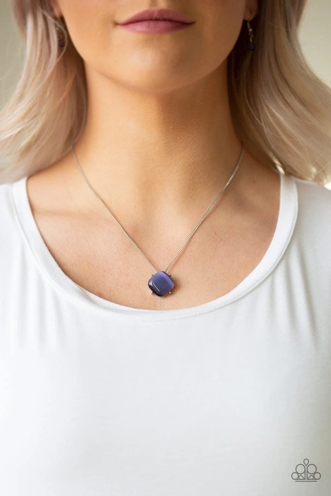 Chiseled into a tranquil square, a glowing purple moonstone pendant swings below the collar for a colorfully refined look. Features an adjustable clasp closure.  Sold as one individual necklace. Includes one pair of matching earrings.