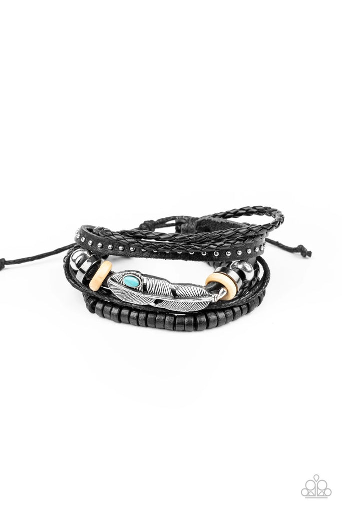 Dotted with a refreshing turquoise stone, an antiqued silver leaf frame is knotted in place along layers of black twine and leather bands featuring wooden and metallic accents for an earthy finish. Features an adjustable sliding knot closure.  Sold as one individual bracelet.