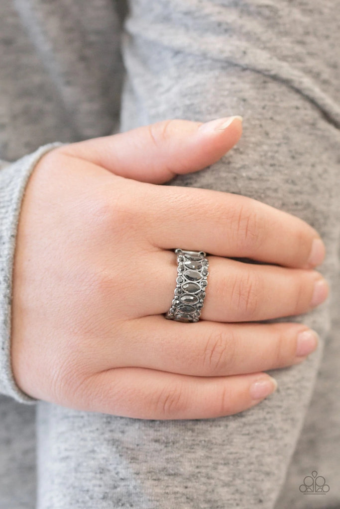 Featuring regal marquise style cuts, glittery hematite rhinestones are encrusted down the center of a silver band radiating with glassy hematite rhinestones for an edgy look. Features a stretchy band for a flexible fit.  Sold as one individual ring.