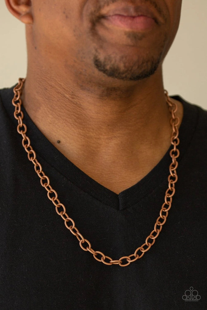 Delicately etched in subtle shimmer, a classic copper chain drapes across the chest for a casual look. Features an adjustable clasp closure.  Sold as one individual necklace.