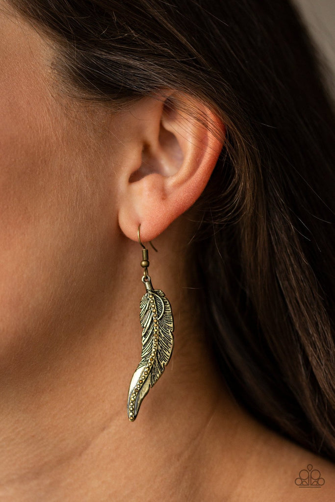 Etched in lifelike textures, the spine of a brass feather is encrusted in glittery aurum rhinestones for an edgy look. Earring attaches to a standard fishhook fitting.  Sold as one pair of earrings.