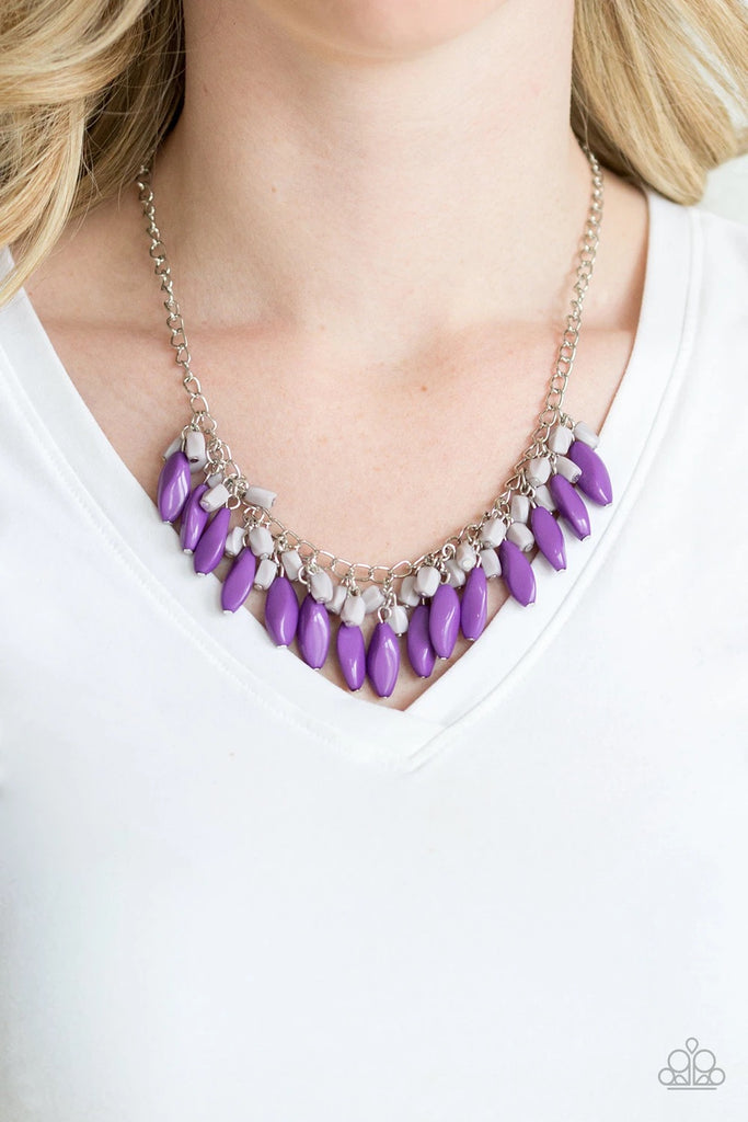 Varying in size and shape, imperfect purple and gray beads cascade from the bottom of a shimmery silver chain, creating a vivacious fringe below the collar. Features an adjustable clasp closure.  Sold as one individual necklace. Includes one pair of matching earrings.