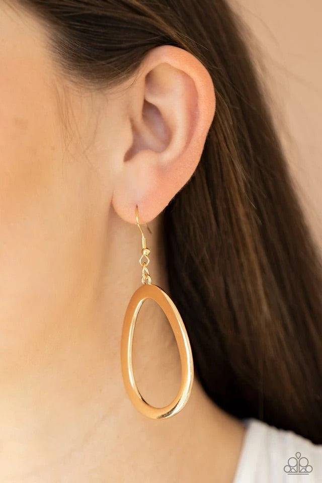 Brushed in a high-sheen finish, a gold oval frame swings from the ear for a casual fashion. Earring attaches to a standard fishhook fitting.  Sold as one pair of earrings.