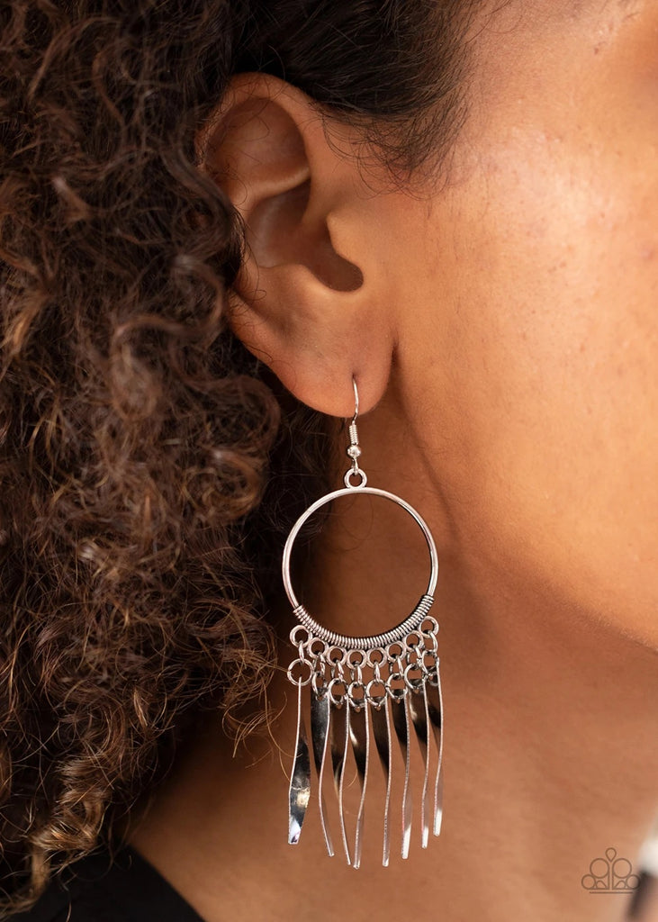Curved silver plates dangle from the bottom of a textured silver hoop, creating a rustic fringe. Earring attaches to a standard fishhook fitting.  Sold as one pair of earrings.
