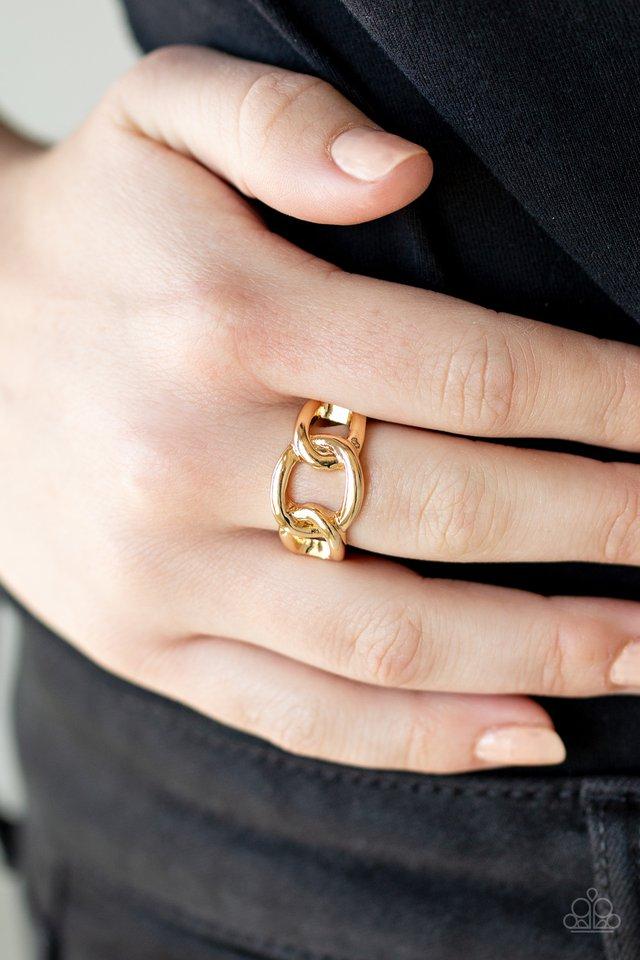 Paparazzi Well Connected - Gold - Glistening gold links connect across the finger, creating an edgy band. Features a dainty stretchy band for a flexible fit. Sold as one individual ring.