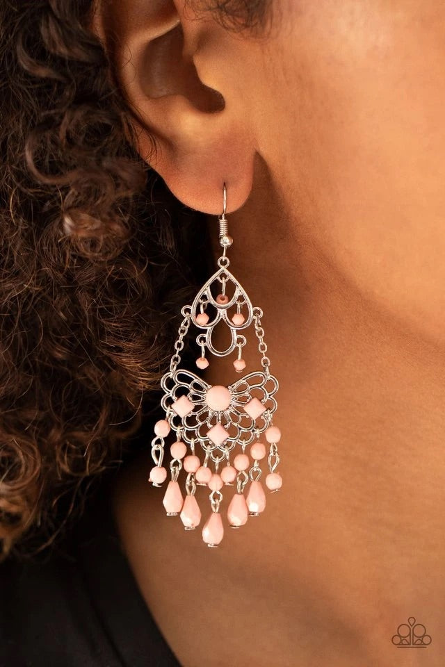 Infused with a dainty collection of Rose Tan beads, two frilly silver frames link into a whimsically stacked lure as matching teardrop and round beaded tassels swing from the bottom. Earring attaches to a standard fishhook fitting.  Sold as one pair of earrings.