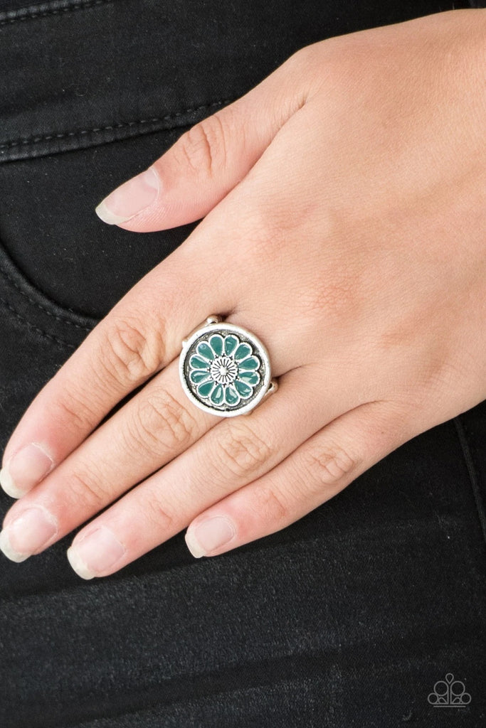 Brushed in an antiqued shimmer, refreshing Quetzal Green petals spin into a whimsical floral pattern atop the finger. Features a stretchy band for a flexible fit.  Sold as one individual ring.