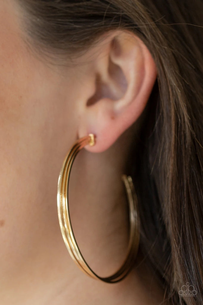 Three flat gold bars curl around the ear, boldly stacking into an edgy hoop. Hoop measures approximately 2 1/2"" in diameter.  Sold as one pair of hoop earrings.