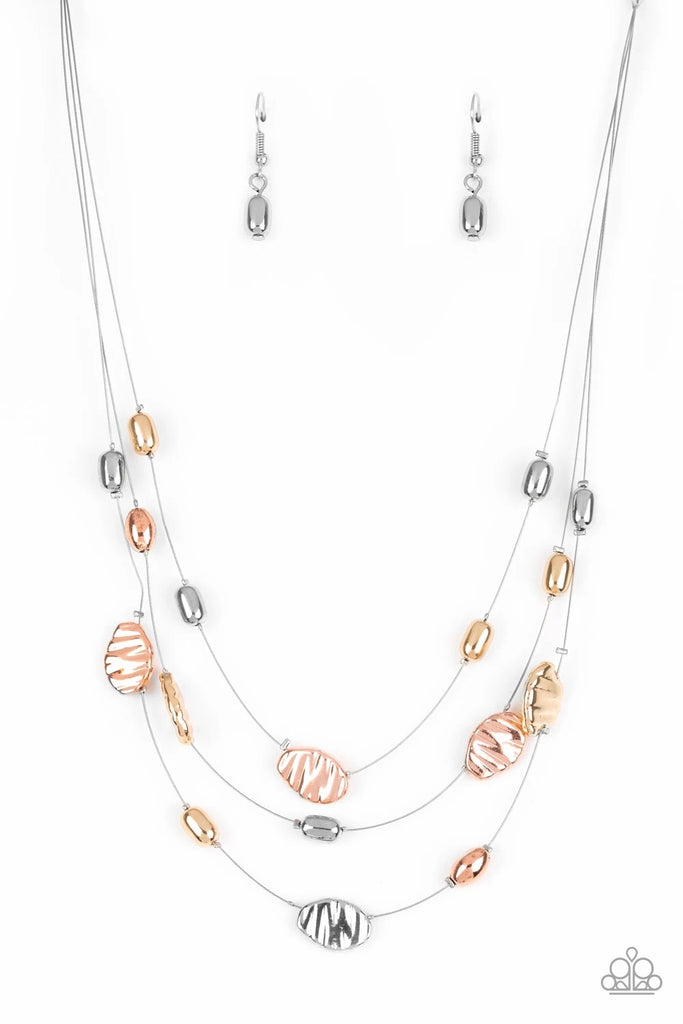 Featuring smooth and delicately hammered finishes, mismatched shiny copper, gold, and silver beads are threaded along dainty silver wire, creating floating layers below the collar. Features an adjustable clasp closure.  Sold as one individual necklace. Includes one pair of matching earrings.