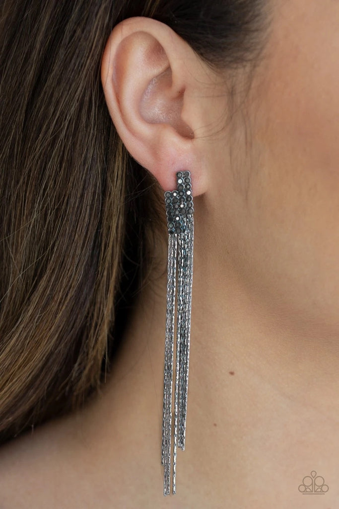 Radiating with dainty hematite rhinestones, asymmetrically stacked frames give way to strands of flat gunmetal chains, creating an edgy chandelier. Earring attaches to a standard post fitting.  Sold as one pair of post earrings.