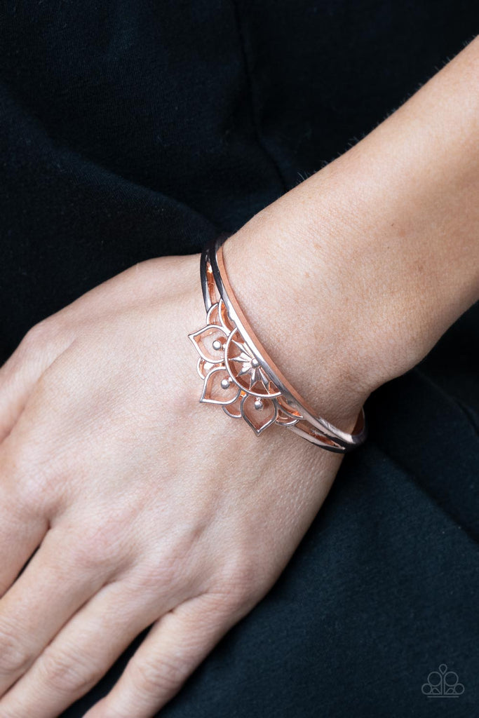 Brushed in a high sheen finish, an airy mandala-like frame crowns the top of a dainty rose gold cuff for a whimsically seasonal flair.  Sold as one individual bracelet. 