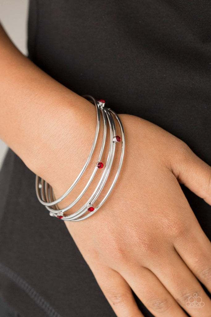Three shiny silver and two red rhinestone encrusted bangles stack across the wrist for a refined look.  Sold as one set of five bracelets.