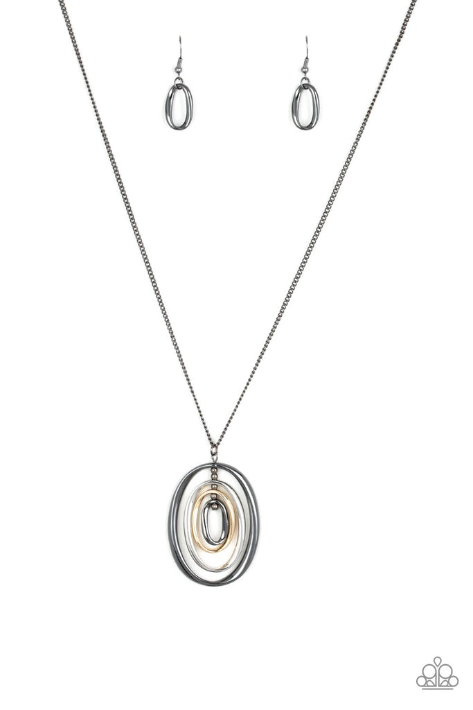 Threaded along a gunmetal-beaded rod, mismatched gold, silver, and gunmetal ovals ripple into a dizzying pendant at the bottom of a lengthened gunmetal chain. Features an adjustable clasp closure.  Sold as one individual necklace. Includes one pair of matching earrings.