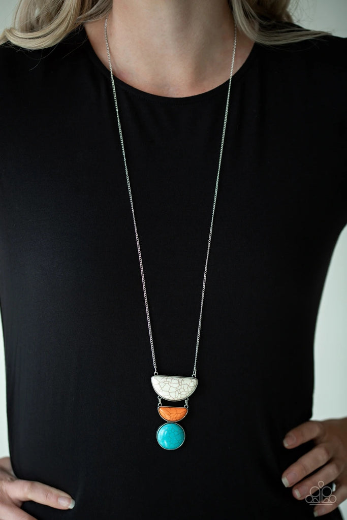 Chiseled into tranquil half-moon and round shapes, refreshing white, orange, and blue stone pendants connect down the chest for a seasonal look. Features an adjustable clasp closure.  Sold as one individual necklace. Includes one pair of matching earrings.