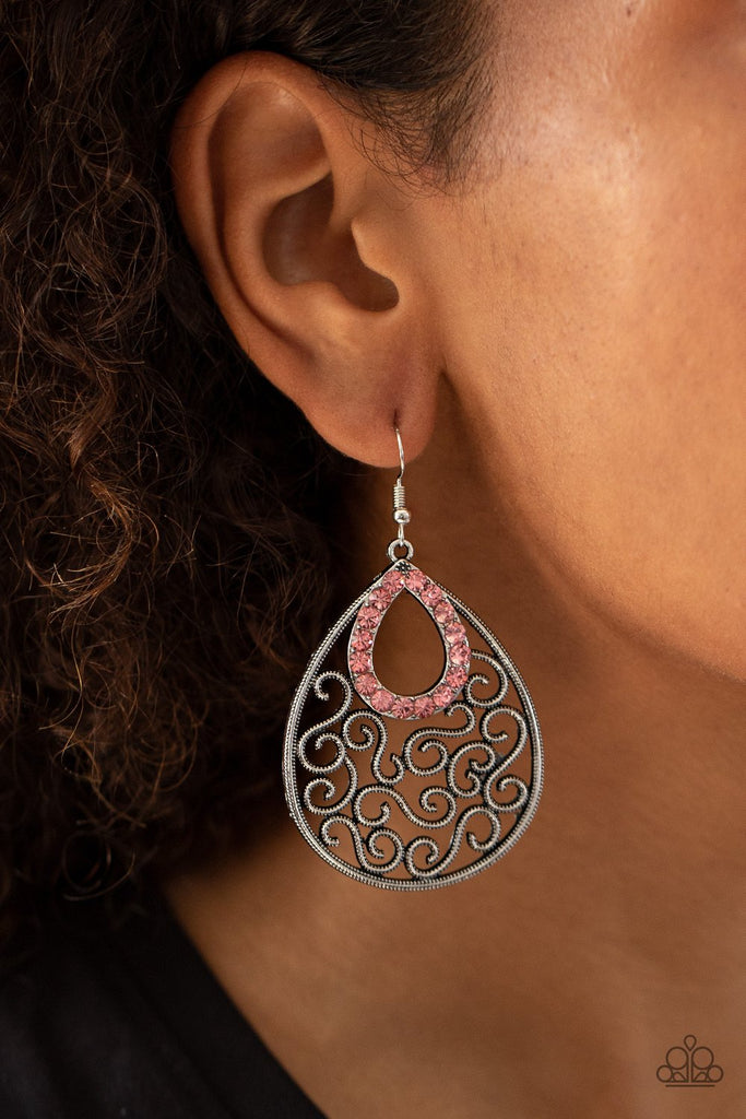 A glittery pink rhinestone teardrop frame nestles at the top of an antiqued silver teardrop filled with whimsical vine-like filigree. Earring attaches to a standard fishhook fitting.  Sold as one pair of earrings.
