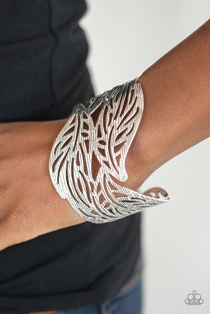 Finely etched in linear patterns, a leafy silver cuff delicately wraps around the wrist for a statement-making seasonal finish.  Sold as one individual bracelet.