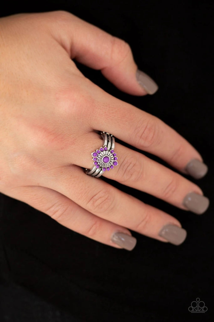 Dainty purple beads are pressed into a shimmery silver floral frame atop a stacked silver band for a whimsical look. Features a dainty stretchy band for a flexible fit.  Sold as one individual ring.  