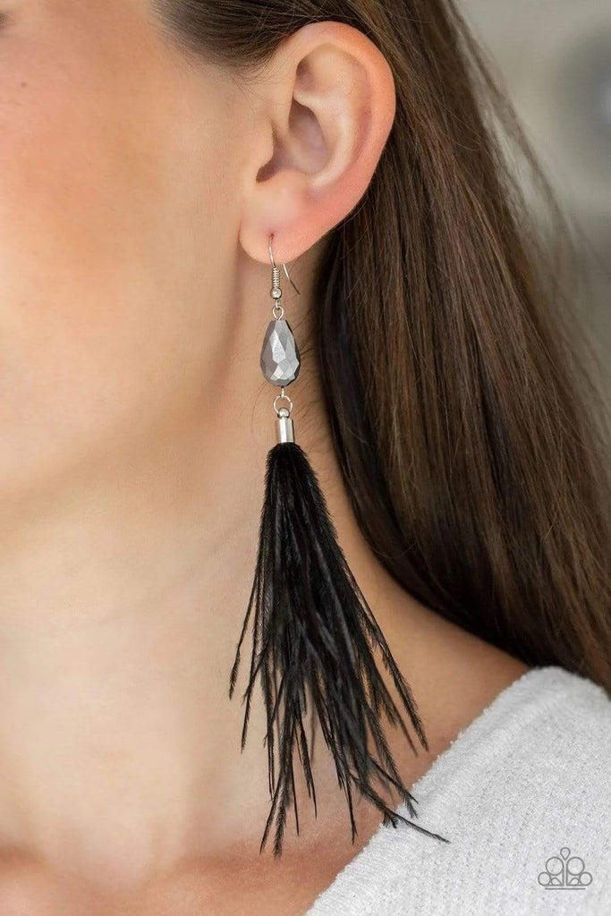 A plume of black feathers flares out from the bottom of a faceted hematite bead, creating a glamorous tassel. Earring attaches to a standard fishhook fitting.  Sold as one pair of earrings.