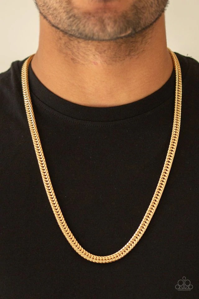 Brushed in a high-sheen finish, a dramatic row of gold flat franco chain drapes across the chest for a casual shine. Features an adjustable clasp closure.  Sold as one individual necklace.