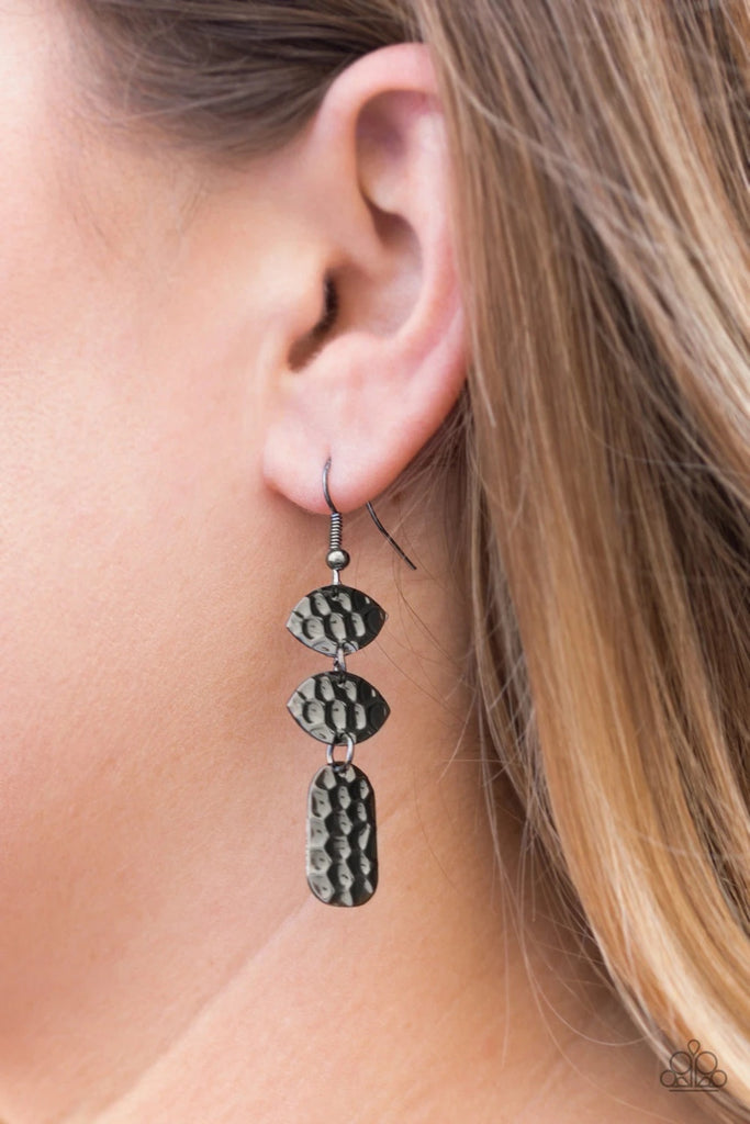 Embossed in tactile geometric textures, mismatched gunmetal frames trickle from the ear, linking into a dainty lure. Earring attaches to a standard fishhook fitting.  Sold as one pair of earrings.