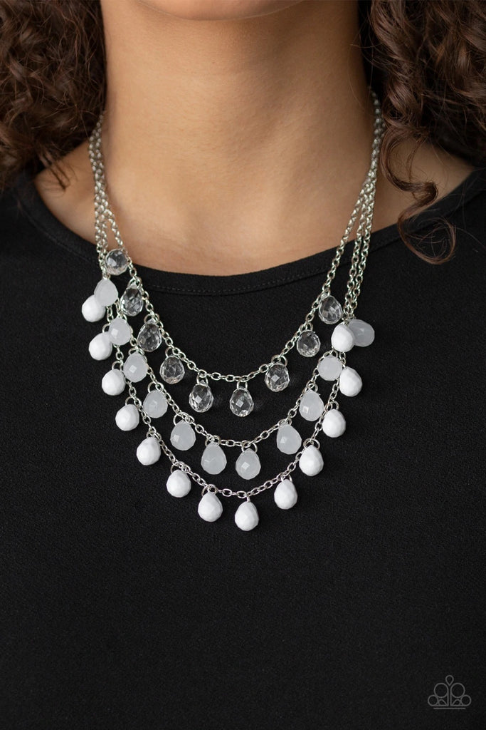 Featuring sparkling faceted finishes, layers of glassy, opaque, and white teardrop beads cascade below the collar for a whimsical ombre effect. Features an adjustable clasp closure.  Sold as one individual necklace. Includes one pair of matching earrings.