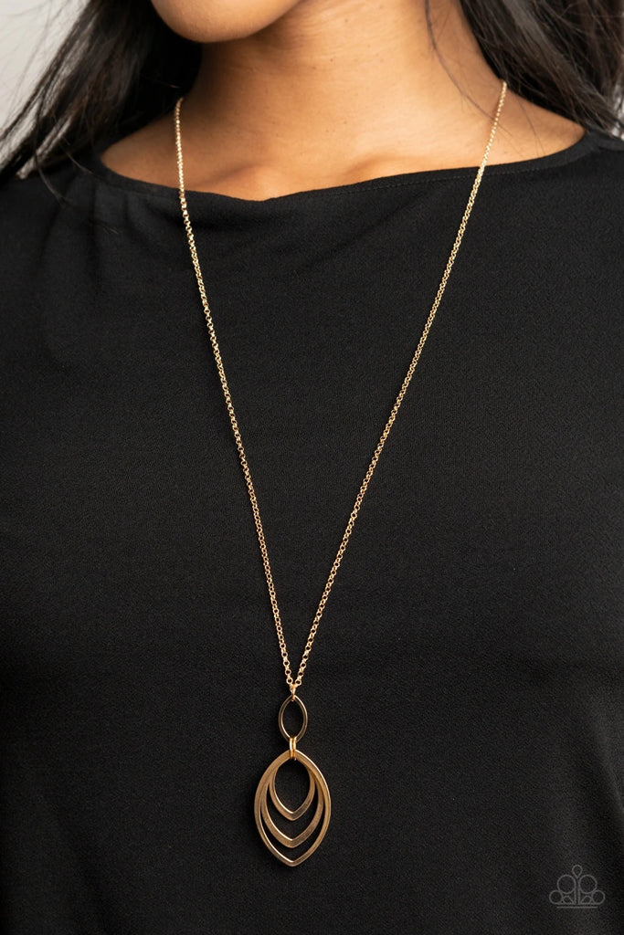 Almond shaped gold frames link to a matching gold frame attached to the bottom of a lengthened gold chain, creating a dizzying pendant. Features an adjustable clasp closure.  Sold as one individual necklace. Includes one pair of matching earrings.