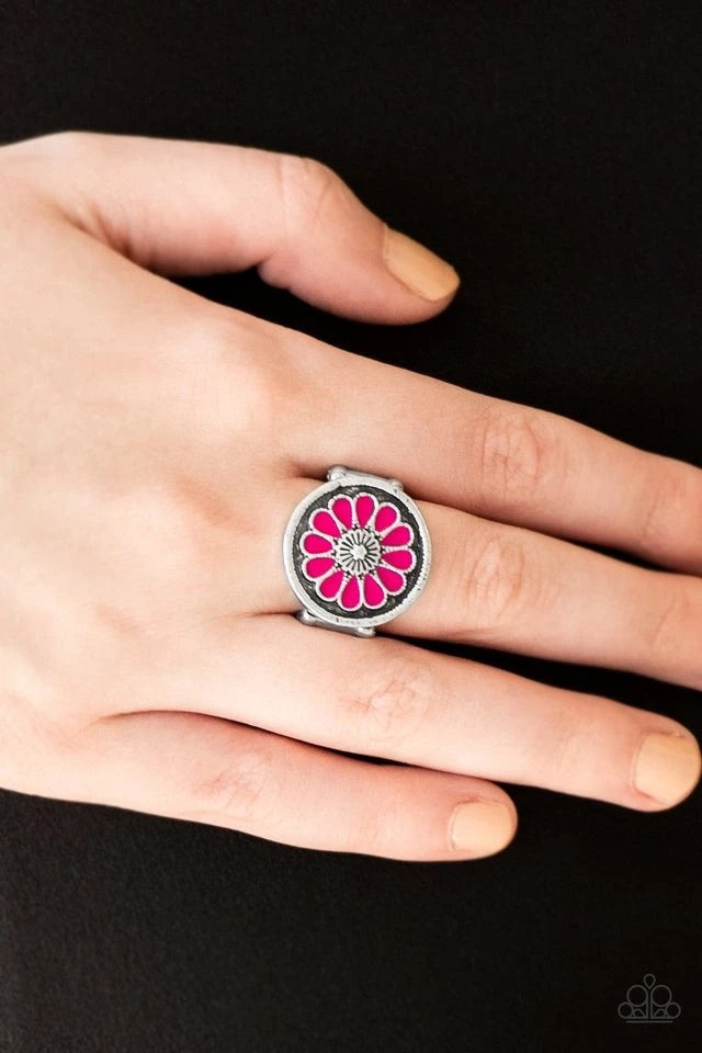 Brushed in an antiqued shimmer, vivacious pink petals spin into a whimsical floral pattern atop the finger. Features a stretchy band for a flexible fit.  Sold as one individual ring.