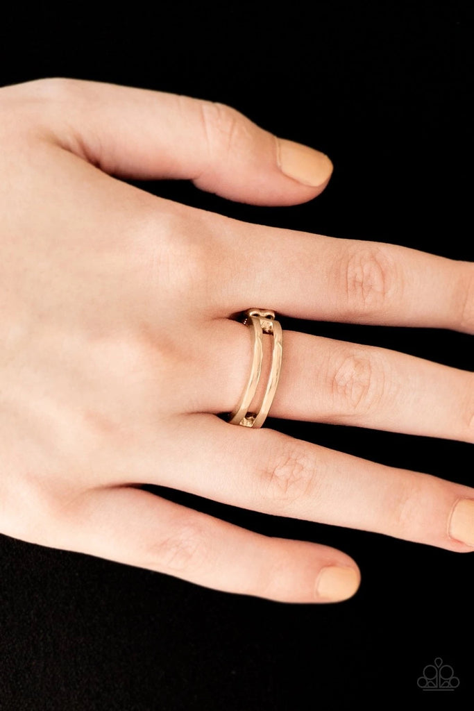 Glistening rose gold bands arc across the finger, joining into an airy band for a casual look. Features a dainty stretchy band for a flexible fit.  Sold as one individual ring.