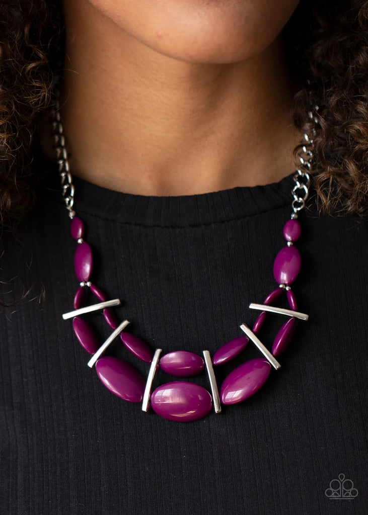 Sectioned off by edgy silver fittings, a flamboyant collection of vivacious plum beads link into two colorful layers below the collar for a bold pop of color. Features an adjustable clasp closure.  Sold as one individual necklace. Includes one pair of matching earrings.
