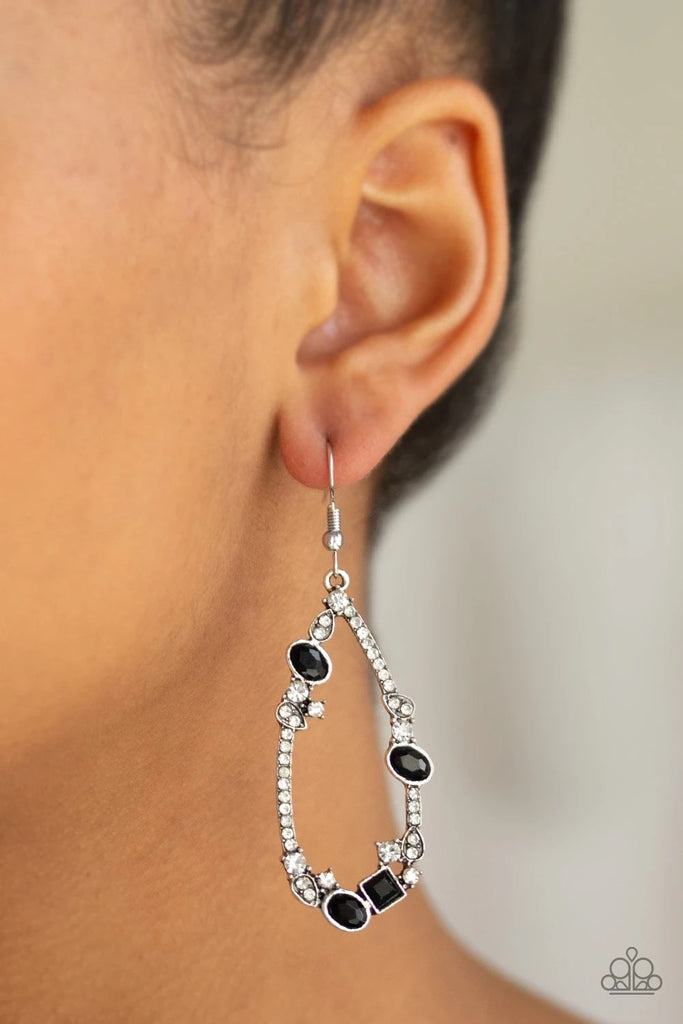 Varying in size and shape, a collection of glassy white and glittery black rhinestones are encrusted along an airy teardrop lure for an edgy-glamorous look. Earring attaches to a standard fishhook fitting.  Sold as one pair of earrings.