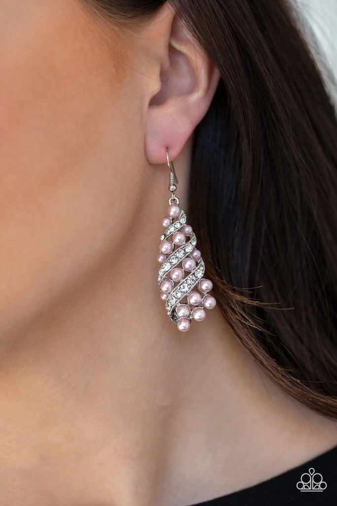 White rhinestone encrusted ribbons wrap around a bubbly pink pearl teardrop frame for a timeless look. Earring attaches to a standard fishhook fitting.  Sold as one pair of earrings.